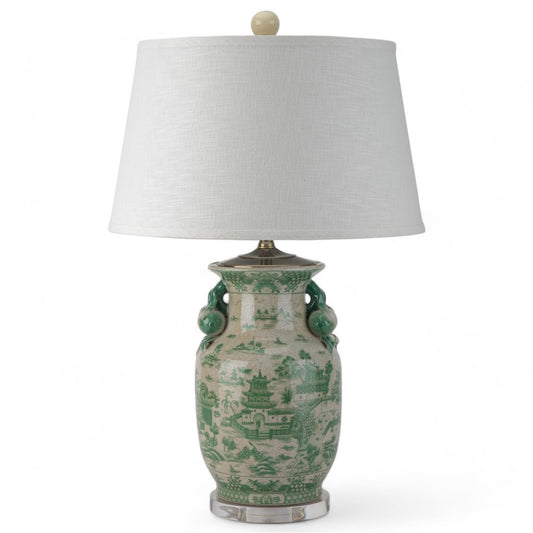Illuminate your living room with the timeless elegance of the Mesa Green and White Porcelain Table Lamp. This contemporary piece features a natural crackle finish with brass accents, complemented by an acrylic base and lamp shade. Add a touch of classic sophistication to your home decor with this stunning lamp.