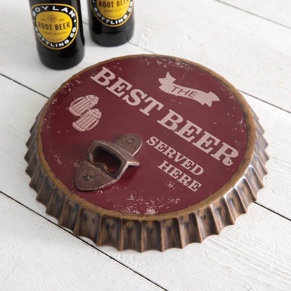 Effortlessly open beer bottles with this unique wall art piece. Featuring a bottle opener and bottle cap design, this beer sign is the perfect addition to any kitchen, man cave, or rustic themed space. Say goodbye to fumbling for a bottle opener and hello to functional and stylish wall decor.