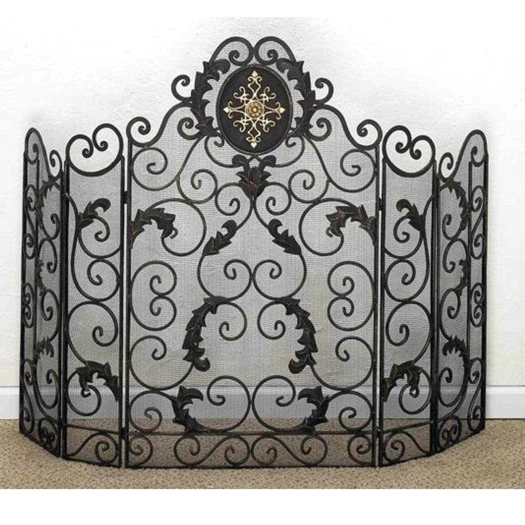 Custom five-panel fireplace screen made from dark brown hand-forged iron with ornate scrollwork and gold decorative medallion at the center.