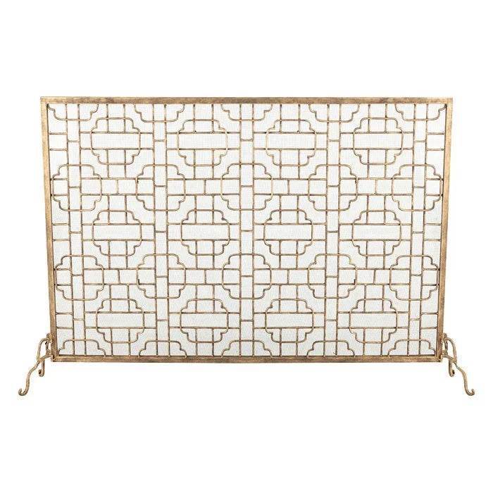 Hand-forged fireplace screen with light burnished gold finish and geometric iron pattern, displayed front-facing with mesh backing.