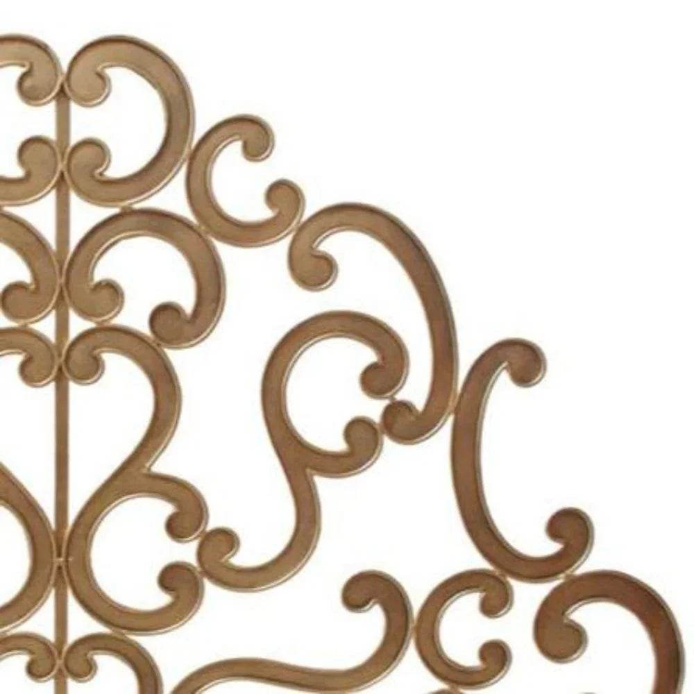 Angled side view of antique gold decorative fire screen showcasing detailed scrollwork and sturdy freestanding metal frame.