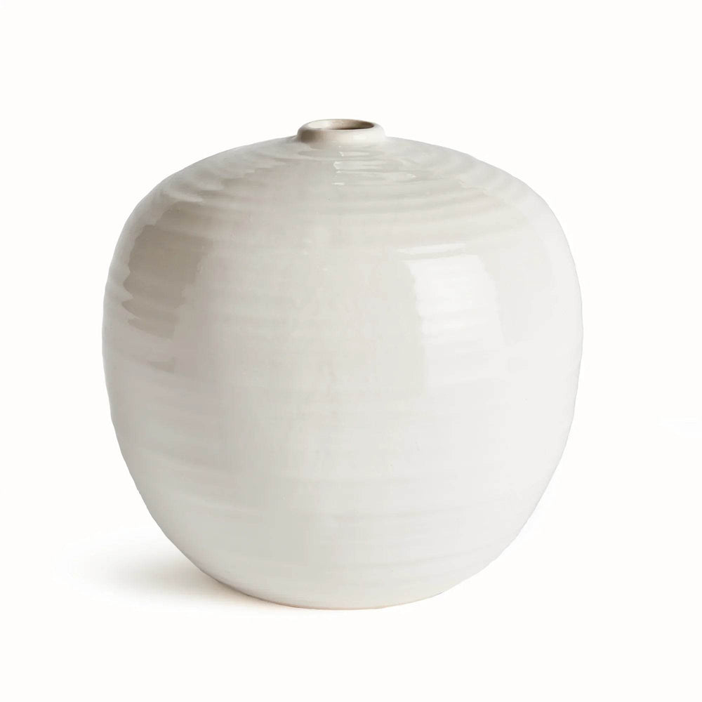 Handcrafted stoneware vase in oatmeal with subtle concentric ridges and narrow top opening, viewed from a side angle.