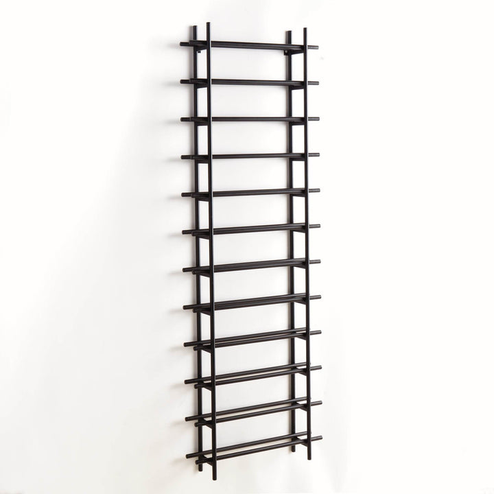 Black iron vertical wall wine rack with 12 bottle capacity, shown empty on white background with ladder-style frame.