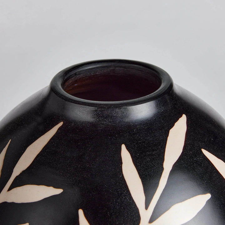 Detail of neck and rim of handcrafted black terracotta vase with ecru vine etching – Modern Organic.