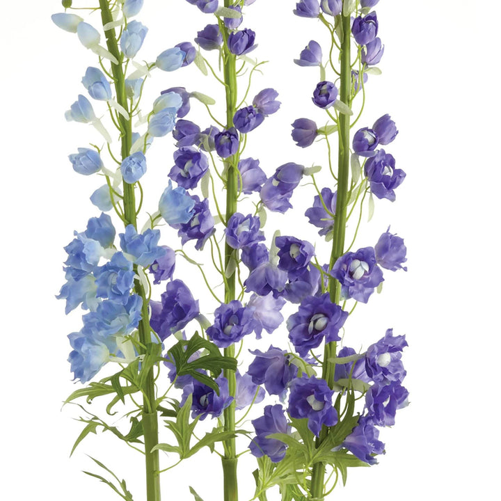 Close-up of artificial delphinium petals in gradient blue and violet with realistic texture – Modern Cottage
