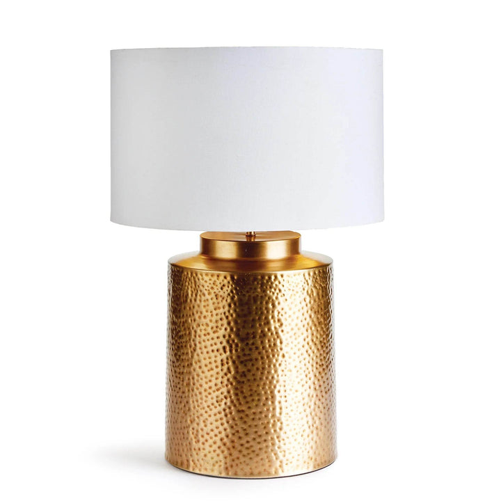 Full view of hammered brass table lamp in organic luxe style with white and gold shade