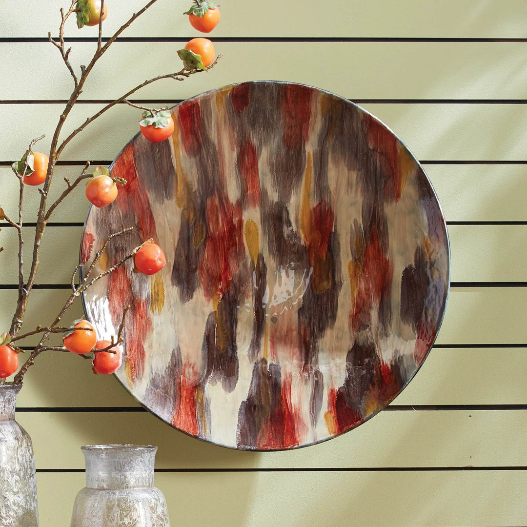 Large enameled iron decorative plate with hand-painted brown, red, and orange brushstrokes, suitable for wall hanging – Seasonal Decor.