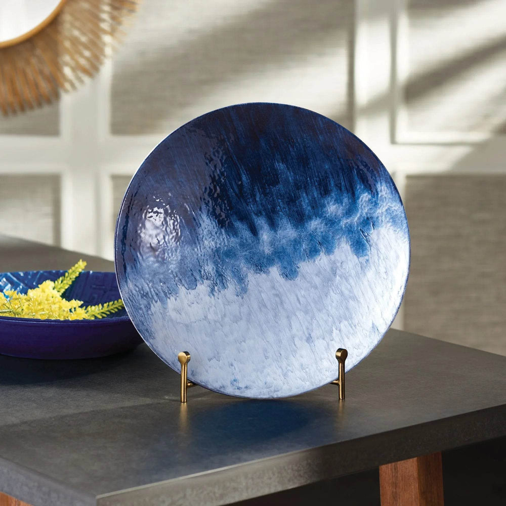Modern coastal enameled iron plate in blue ombre finish, styled on a tabletop stand
