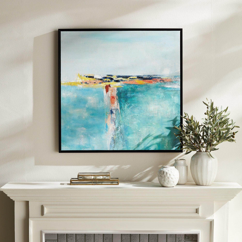 Modern coastal wall art canvas styled above a white mantle with pottery accents, capturing soft coastal light.