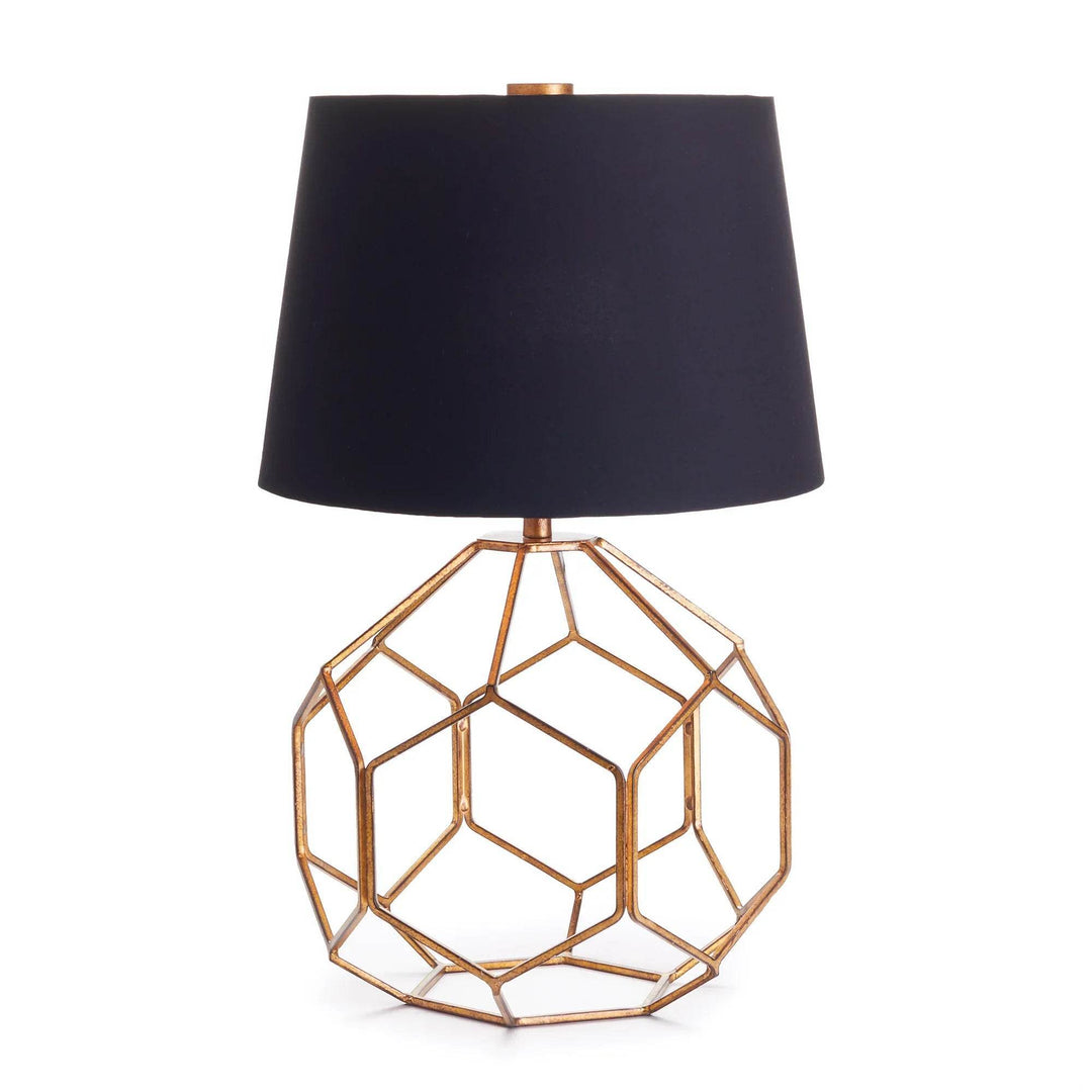 Modern table lamp with black shade and antique gold base on white background