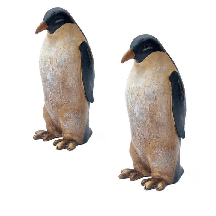 Set of Two Decorative Penguin Statues – Studio View Against White Background
