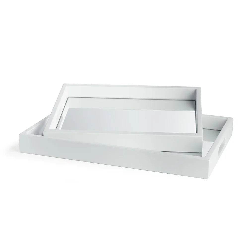 Set of two white rectangular mirrored trays with handles, perfect for modern coastal styling.