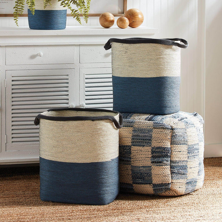 Blue and white woven storage baskets styled with coastal decor in living room – Modern Coastal.