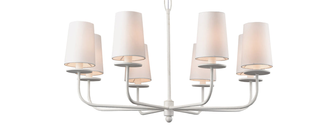 Decorative chandeliers and pendant lights in glass, rattan, and metal styled in coastal, boho, and minimalist spaces.
