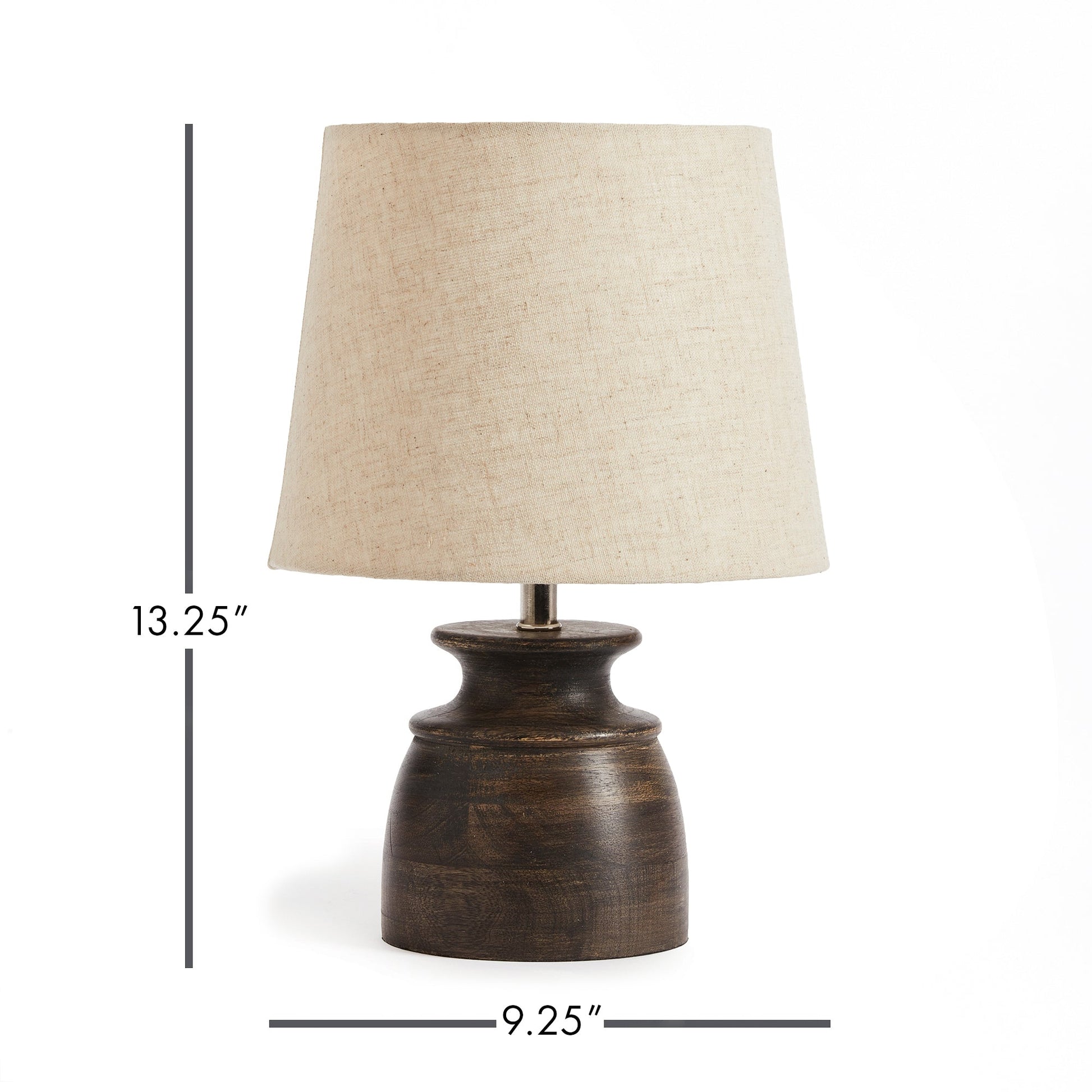 The petite shape makes the Benji Lamp ideal for kitchen or small workspace. The washed black, mango wood Base and natural linen shade give it an elegant touch. This table lamp is perfect for adding a touch of elegance to your kitchen or small workspace. The mango wood base features a washed black finish and pairs beautifully with the natural linen shade.