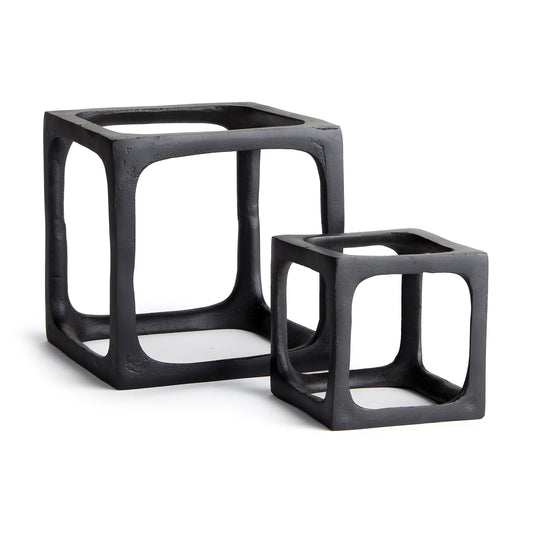 What is better than a simple three dimensional cast aluminum rendition of a square? A set of two. These cubist sculptures are a fun, modern accent for bookshelf, coffee table or desk.