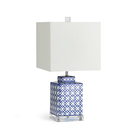 With a bold pattern and square shape, this lamp is a handsome choice for any space. On a side table, console or shelf, a stunning way to lighten up the room.