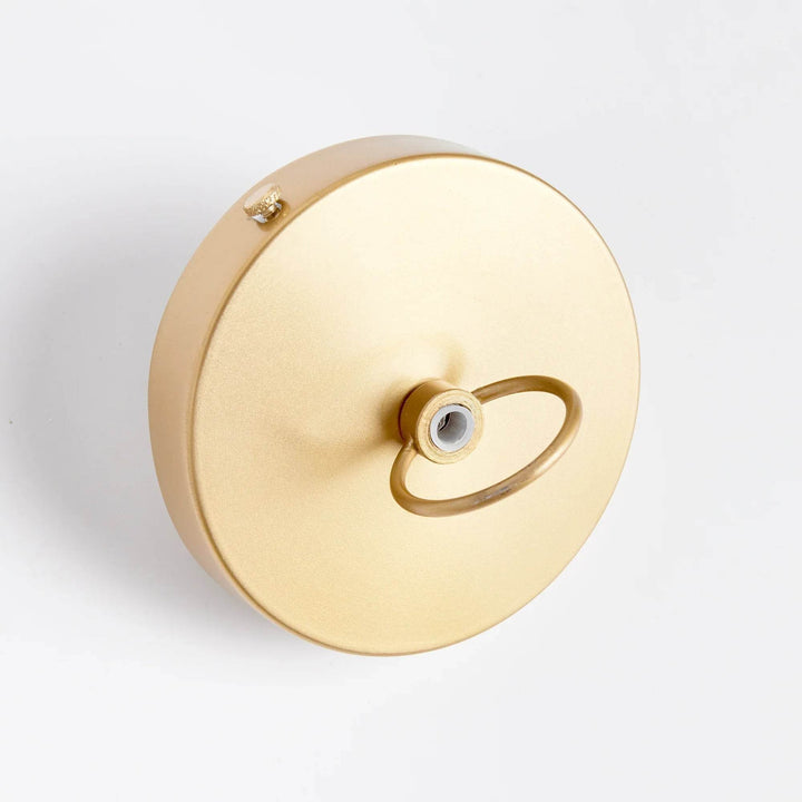 Experience the timeless style of the Maye Petite Bell Pendant Light in white, featuring a natural cane rattan weave with unique variations in color. The brass details on the top and bottom rim add a refined touch to this classic piece. Whether hung in a kitchen, entryway, or hallway, this pendant light will elevate any space with its sophisticated charm.