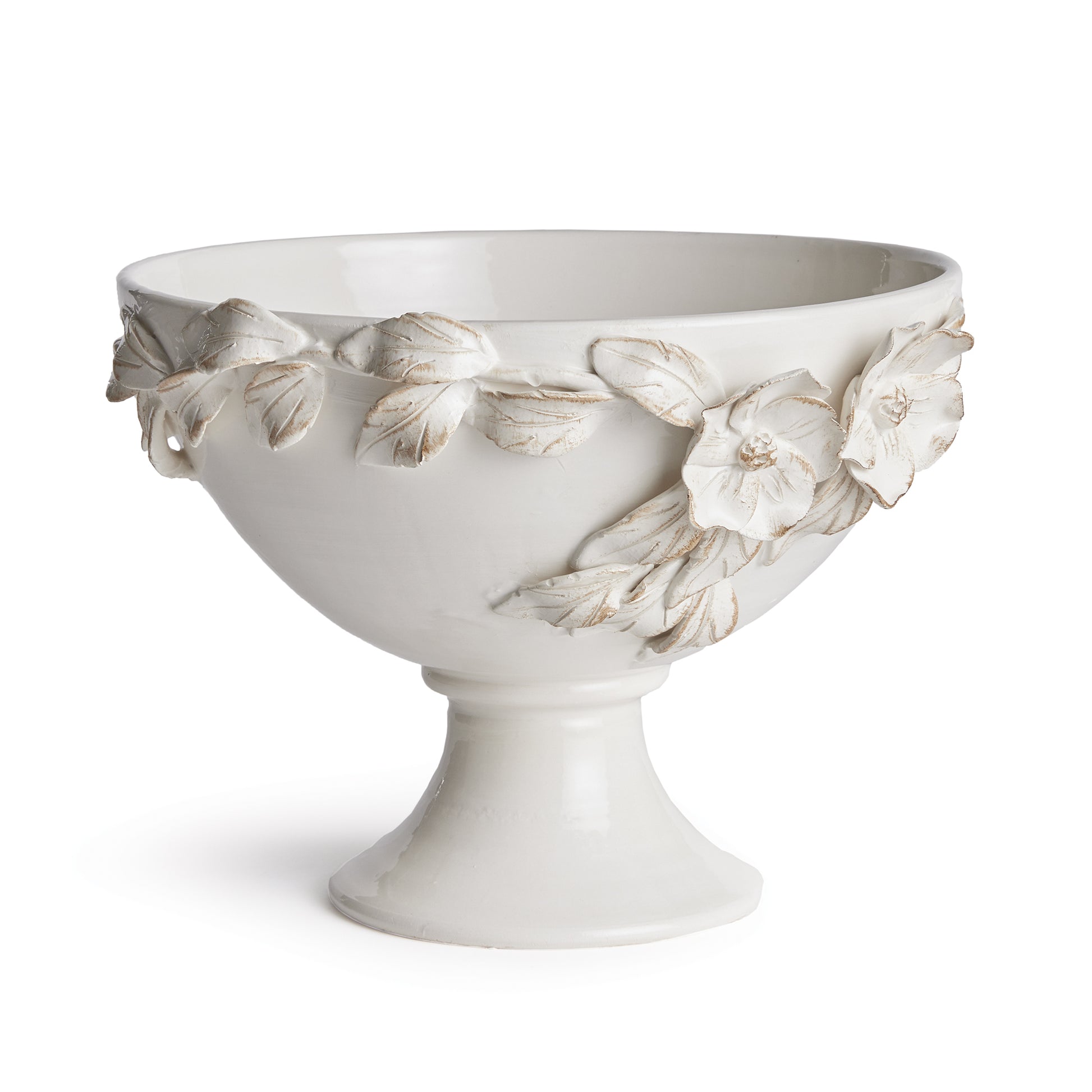 Each and every dogwood flower and leaf detail of the Fiori Decorative Bowl is handmade, and hand-applied by Italian artisans in Tuscany, Italy. A seamless design in a soft white glaze and delicate antiquing along petal edges. With a classic Italian craftsmanship passed down through generations, each piece is a true original. In grand scale, a dynamic centerpiece for feature table, kitchen island or mantel.