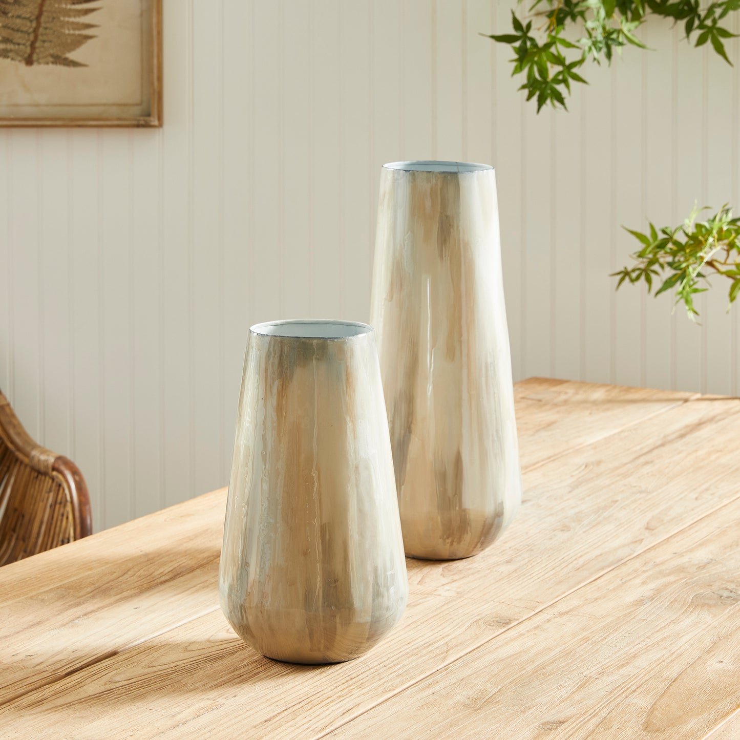 Using enameled iron in an innovative manner, these delicately crafted vases are hand-painted, each one featuring a charming tone-on-tone design. This technique produces a lovely light and creamy effect, making for a distinctive addition to any space. Crafted with expertise, Almeta White Pearl Vase Small stands out with its innovatively crafted enameled iron and charming tone-on-tone design. This unique technique produces an elegant, light and creamy effect that adds a distinctive touch to any room.