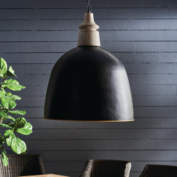 This pendant light features a golden interior lining, providing an elegant and functional balance. Whether in the entryway, hall, or above the kitchen table, it adds sophistication to any space. The larger version comes in black, gold, and natural wood, making it a versatile addition to your decor.