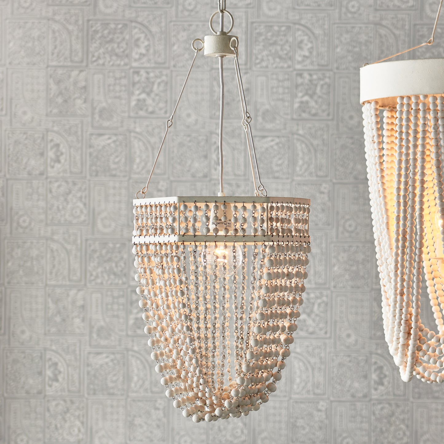 Dripping with sophistication, the Kiara Pendant is utterly on trend. Illuminate the entryway, hall or kitchen table in feminine style. Expertly crafted with a touch of femininity, the Kiara Beaded Pendant Light adds a sophisticated touch to any space. Use it to brighten up your entryway, hall, or kitchen table - and stay on-trend while doing so.