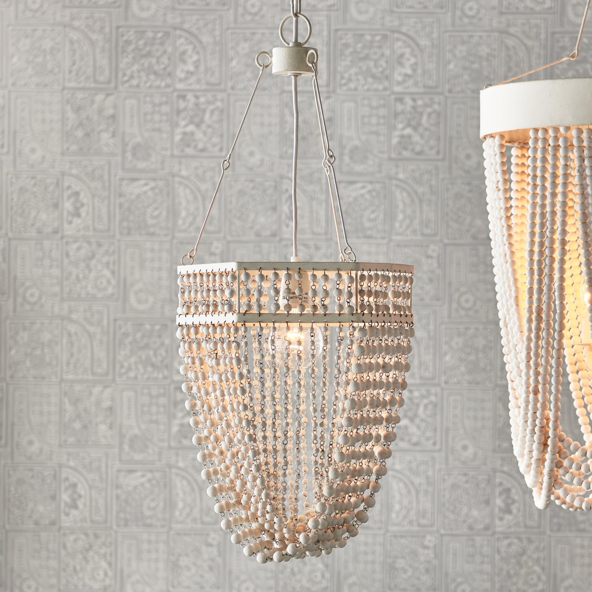 Dripping with sophistication, the Kiara Pendant is utterly on trend. Illuminate the entryway, hall or kitchen table in feminine style. Expertly crafted with a touch of femininity, the Kiara Beaded Pendant Light adds a sophisticated touch to any space. Use it to brighten up your entryway, hall, or kitchen table - and stay on-trend while doing so.