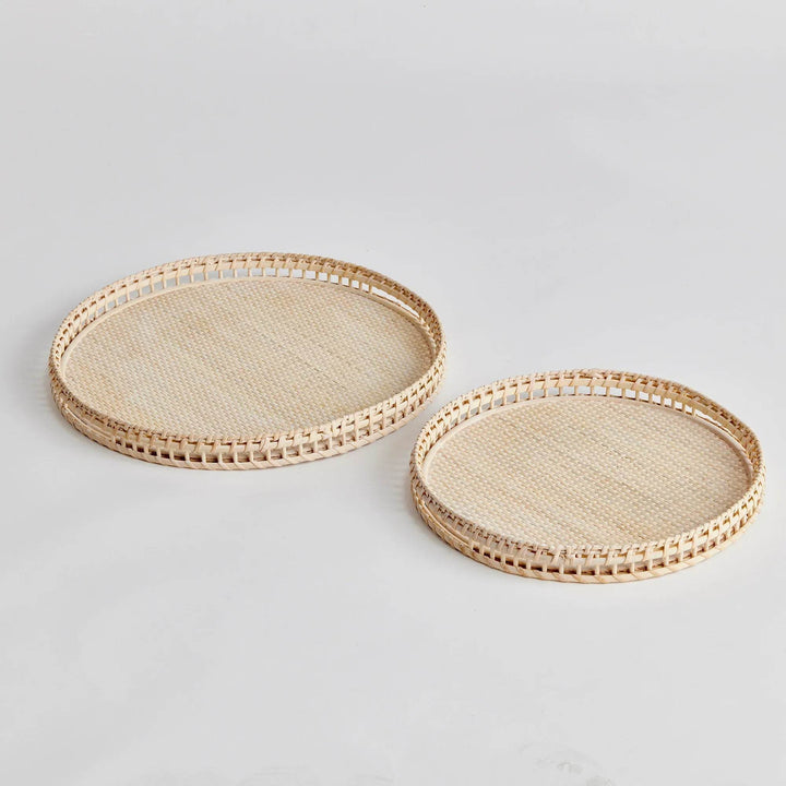Crafted from woven rattan and coated with a fresh whitewash finish, these coastal-inspired trays add a touch of charm to any space. Use them on your coffee table or ottoman as a stylish base for creating beautiful vignettes. Enhance your home decor with Barri Coastal Decorative Trays Set of 2.