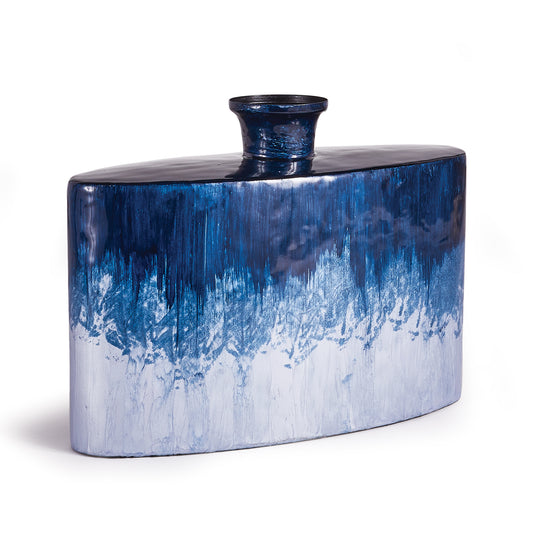 In a clever use of enameled iron, this lightweight, abstracted ombre beauty is painted by hand in a deep blue palette taken directly from nature. Simple elegance defined.