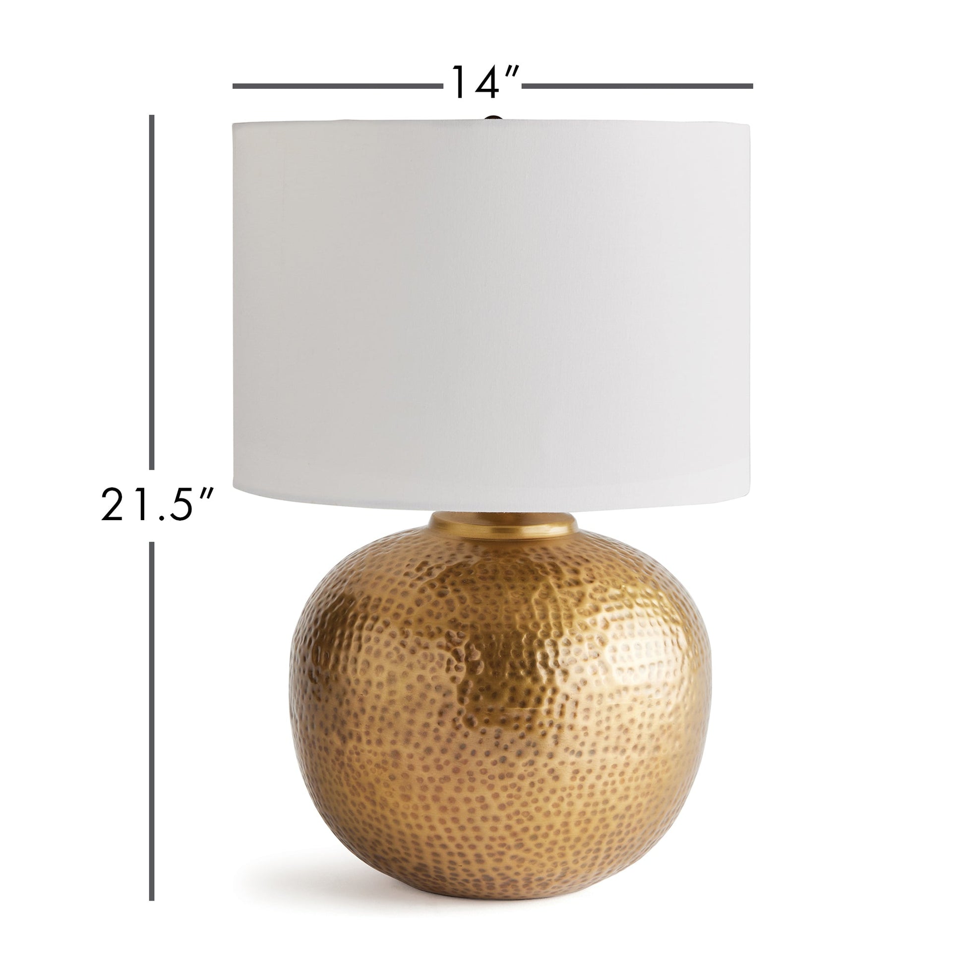 Enhance any room with the elegant style of Tara Gold &amp; White Table Lamp Small. The warm brass round base exudes a luxurious feel, while the crisp white linen drum shade offers a gentle radiance. Crafted from hammered iron and featuring unique handmade elements, this lamp is the perfect addition to any modern space. Dimensions