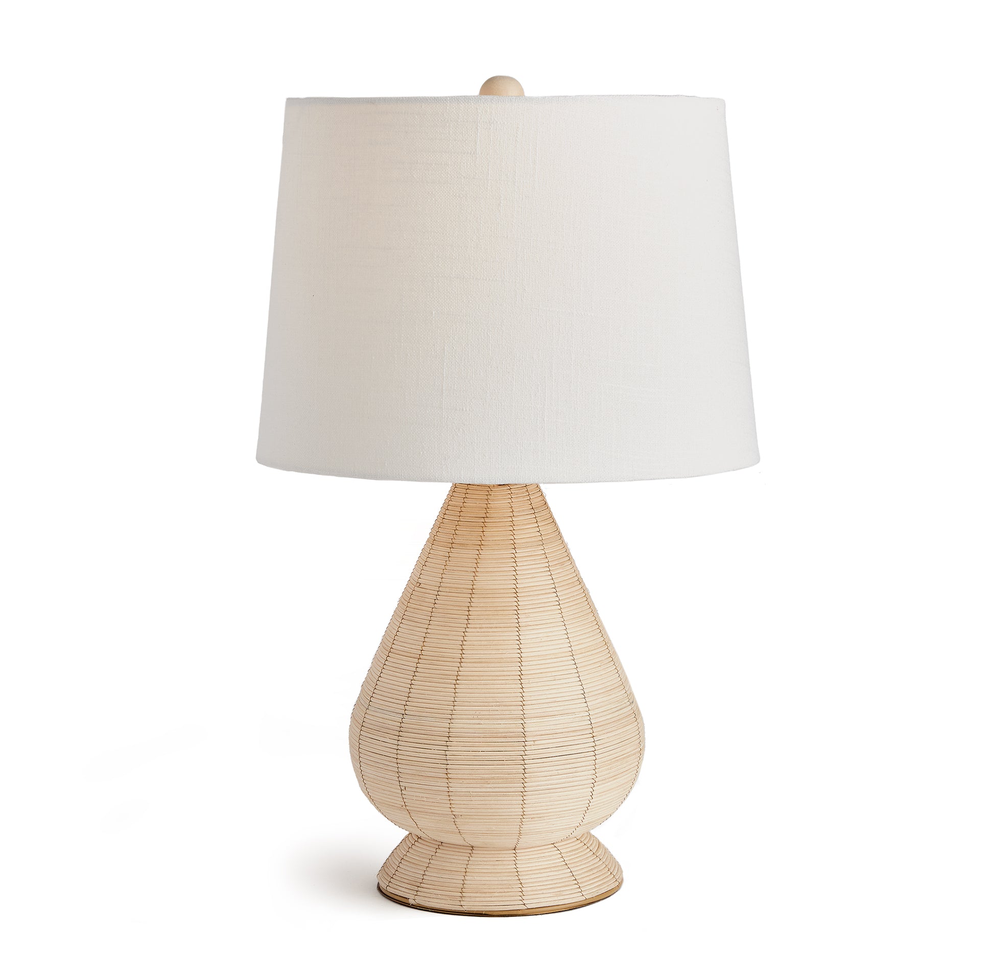 Woven in a whitewash cane rattan, with subtle variations in color that makes each one truly unique, this lamp is an instant classic. Topped with a wide cylindrical shade, a perfect accent for bedroom, living room or study.