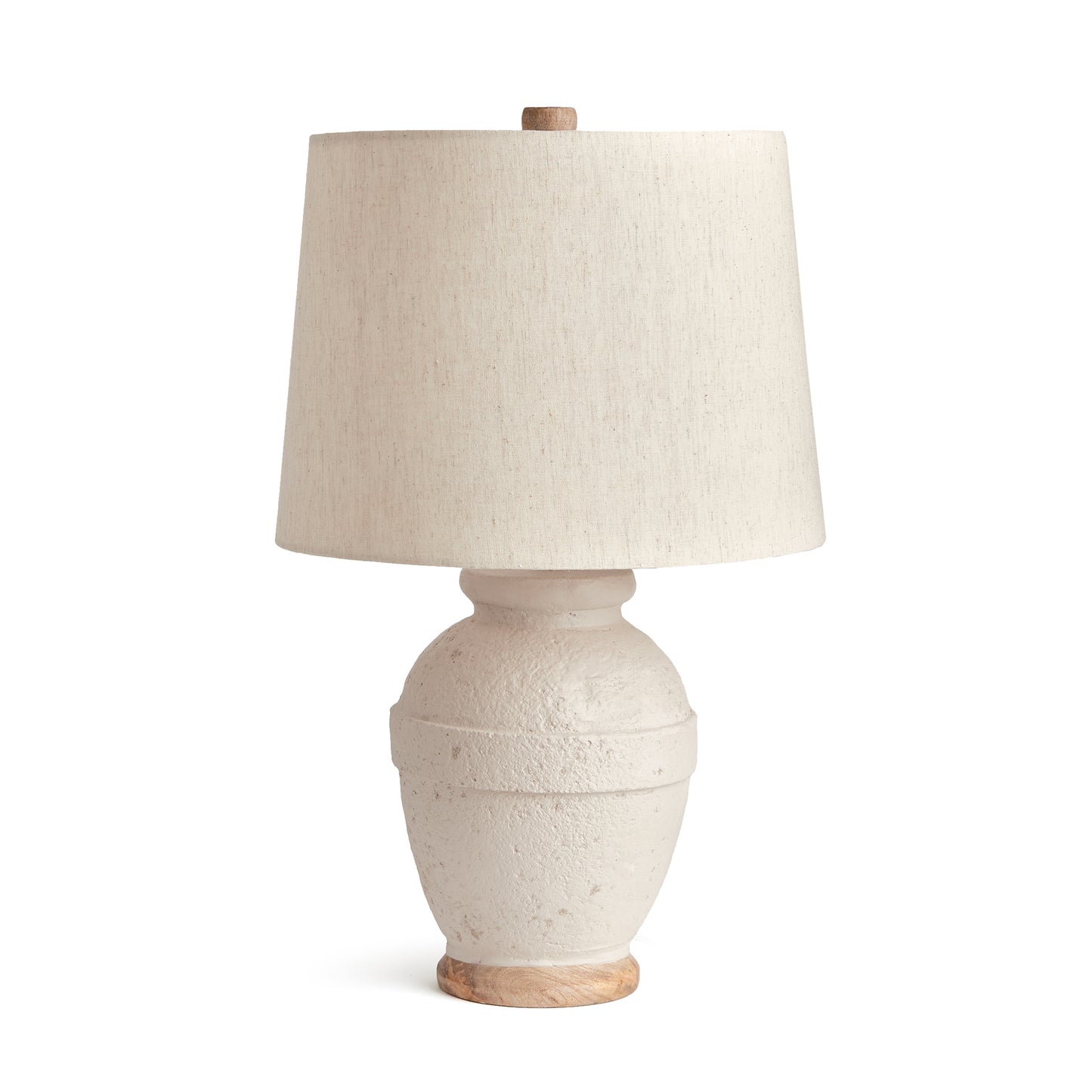 Made of a composite, natural Eco mix, this lamp Base is composed of hardening agents for longevity. The finish is warm white with a pitted texture that shows the composition of the material. With a linen tapered shade and banded silhouette, this petite lamp is ideal for bedside table or desk.