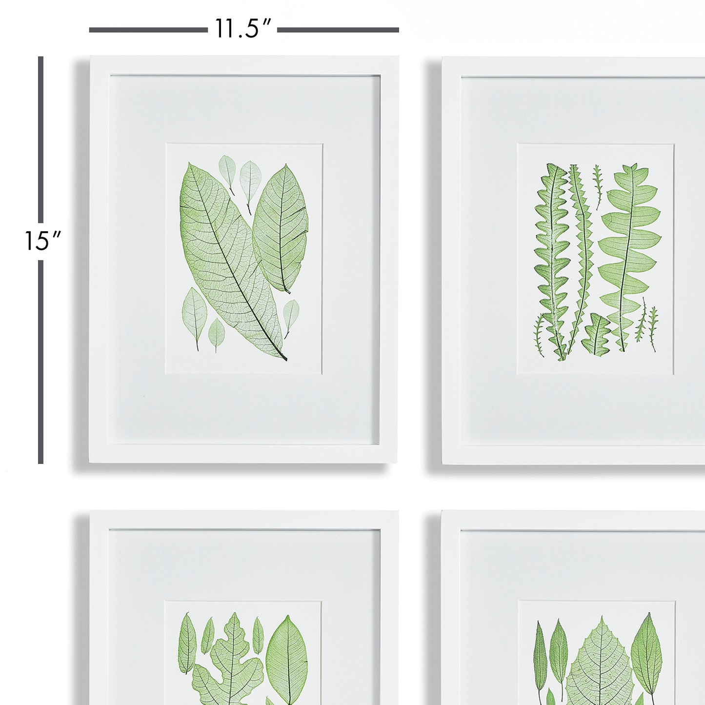 This set of four green leaf prints features a woodcut-style design and white mat, perfect for adding a touch of nature and freshness to any room. The simple frame adds a classic touch, making these prints a charming addition to a powder room or study.