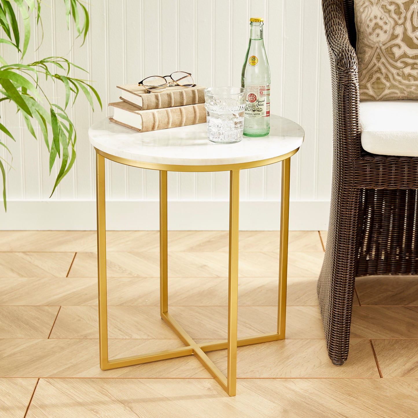 Crafted from a blend of white marble and brass, this elegant cocktail table exudes a timeless and sophisticated aesthetic. Its smaller size makes it a versatile piece that can easily be moved around, whether it's for serving cocktails, appetizers, or providing a sturdy surface for a laptop.