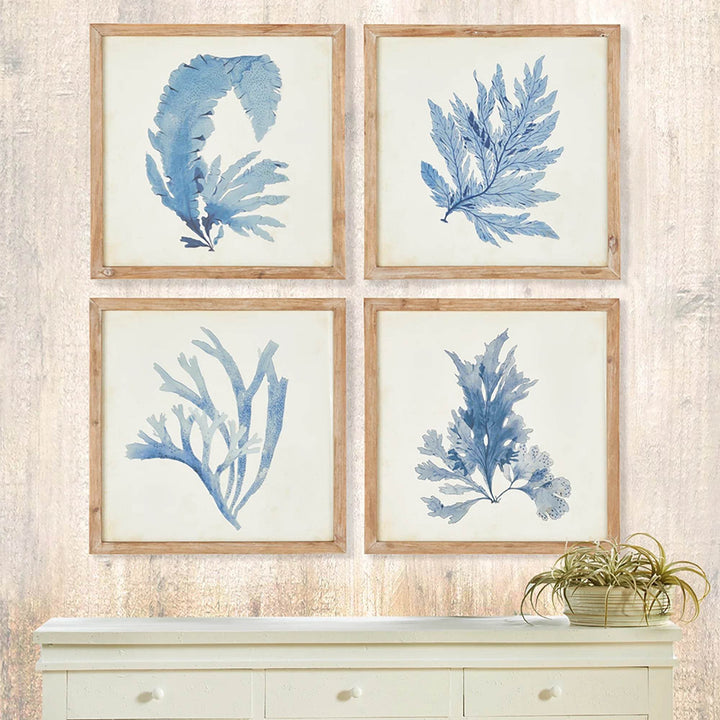 These coral prints offer a unique blend of elegance and scale, perfect for a coastal, upscale aesthetic. The soft, watercolor design and whitewashed frames suit both home and office settings. Experience sophistication and coastal charm in your space with these exquisite coral prints. The delicate watercolor design and natural wood frames elevate any room, making them versatile additions to any home or office.