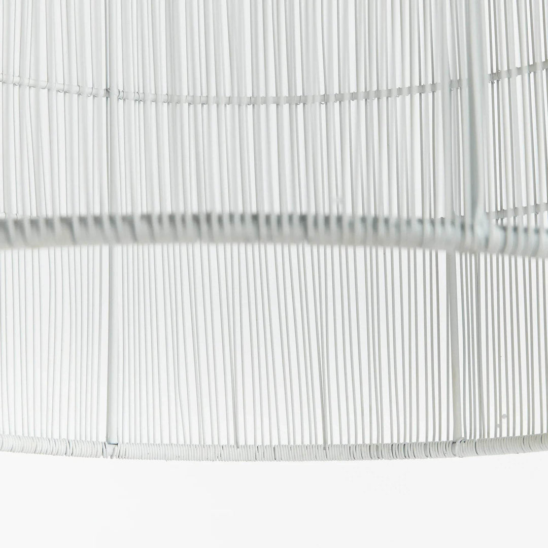 This pendant light features a solid iron frame that is elegantly wrapped in delicate white matte metal strands. With an open design, it brings a beautiful symphony of light, making it a great choice for placement in kitchens or foyer areas. Expertly crafted, it creates an elegant and grand aesthetic with its combination of materials.
