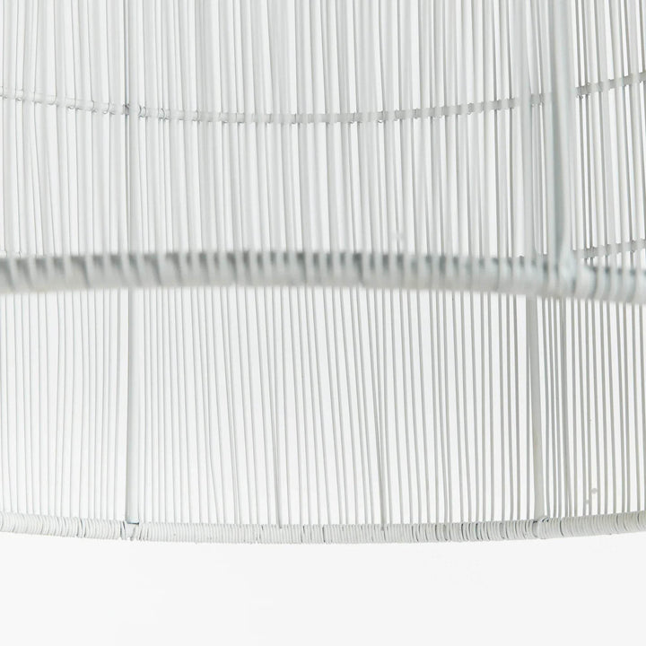 This pendant light features a solid iron frame that is elegantly wrapped in delicate white matte metal strands. With an open design, it brings a beautiful symphony of light, making it a great choice for placement in kitchens or foyer areas. Expertly crafted, it creates an elegant and grand aesthetic with its combination of materials.