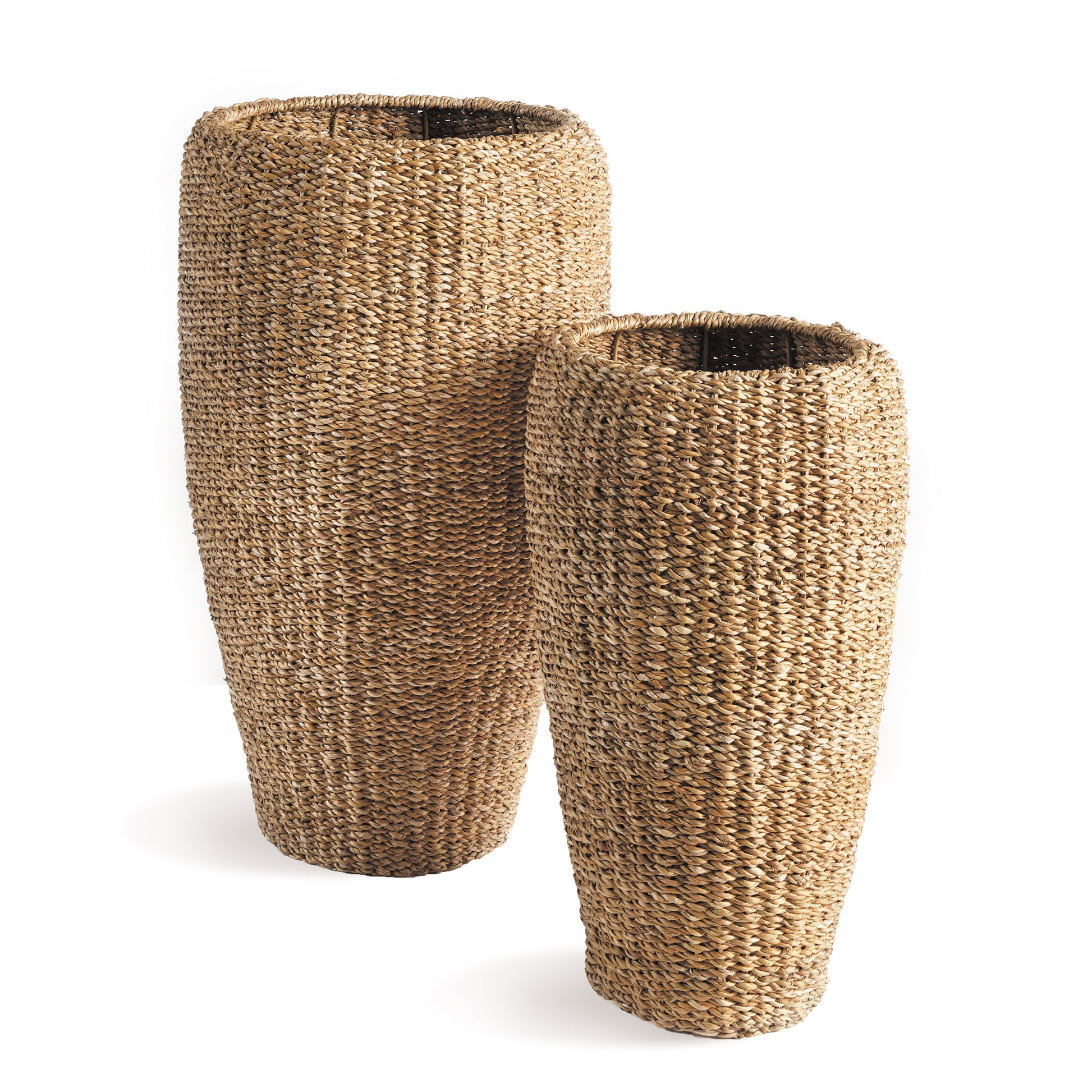 This set of tall seagrass planters are tightly woven around a wire metal frame. This warm, natural look in an over-scaled planter is a fresh look for your tall faux greens.