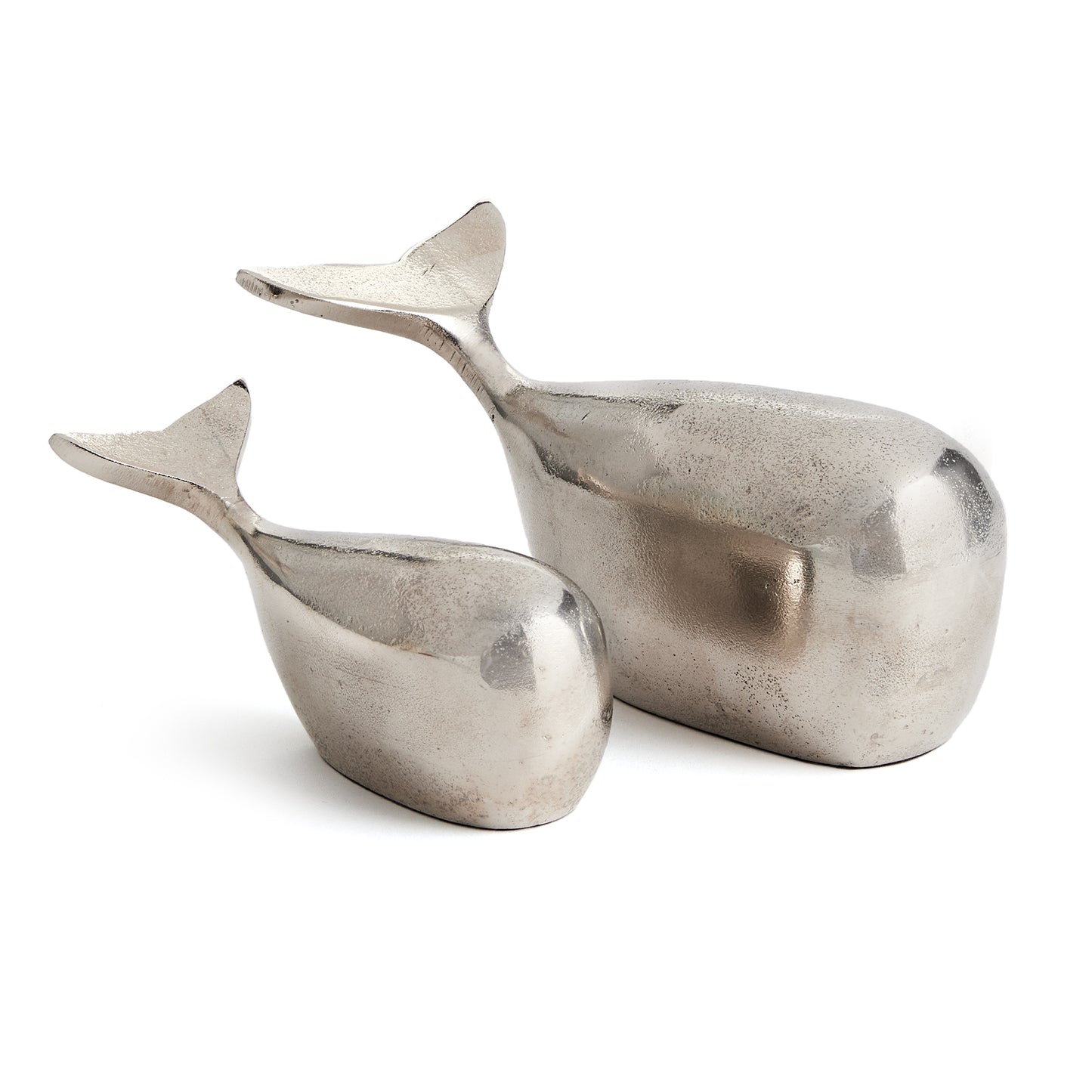 Expertly crafted from solid aluminum, these modern whale sculptures exude charm and coastal vibes. While smaller in size, they make a great shelf accent and add character to any space. Experience the durability and sleek design of these refined sculptures.