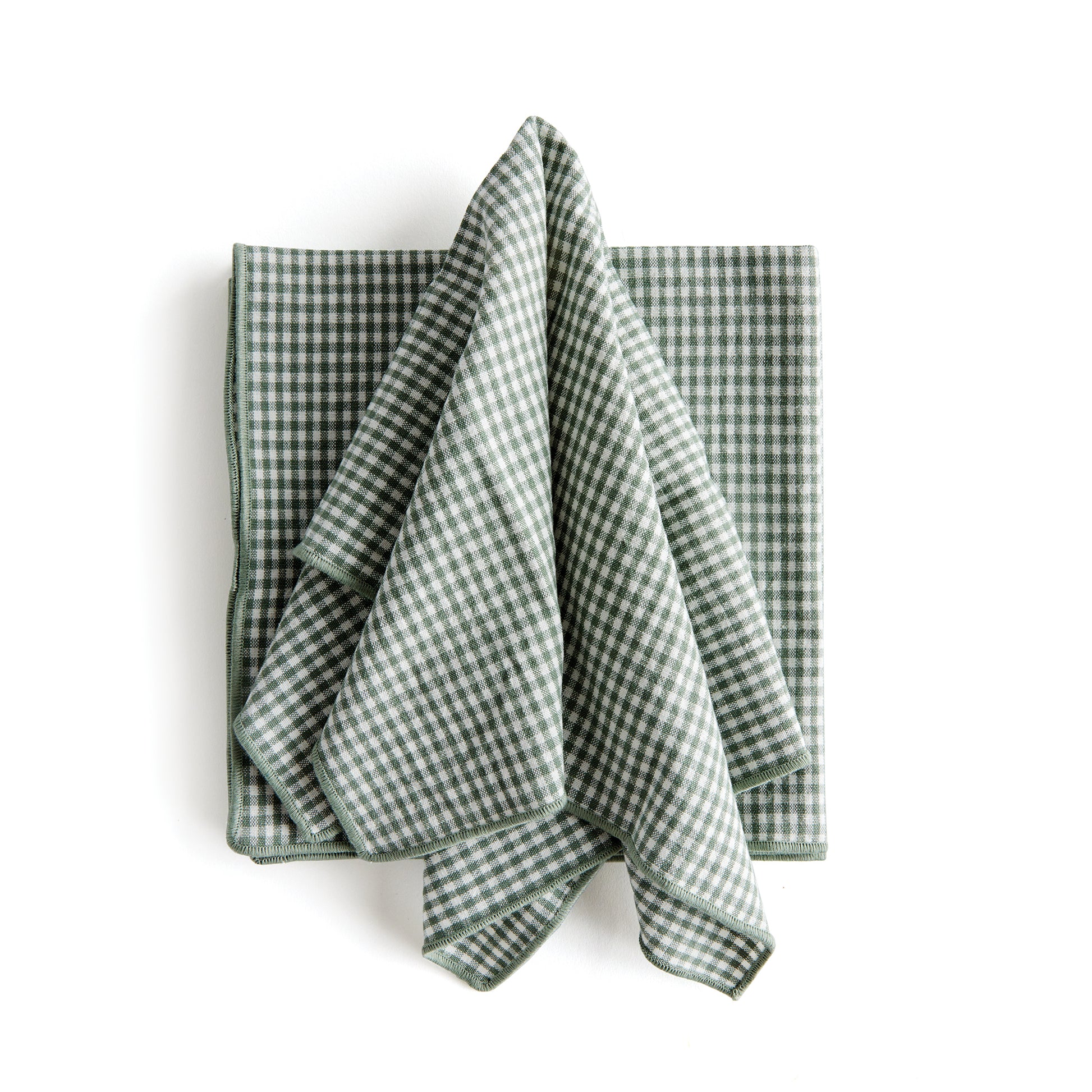 Bring a touch of softness to the table with this set of four cotton napkins. Beautiful in tone and texture, the verdant green is designed to add a pop of signature color to your tablescape.