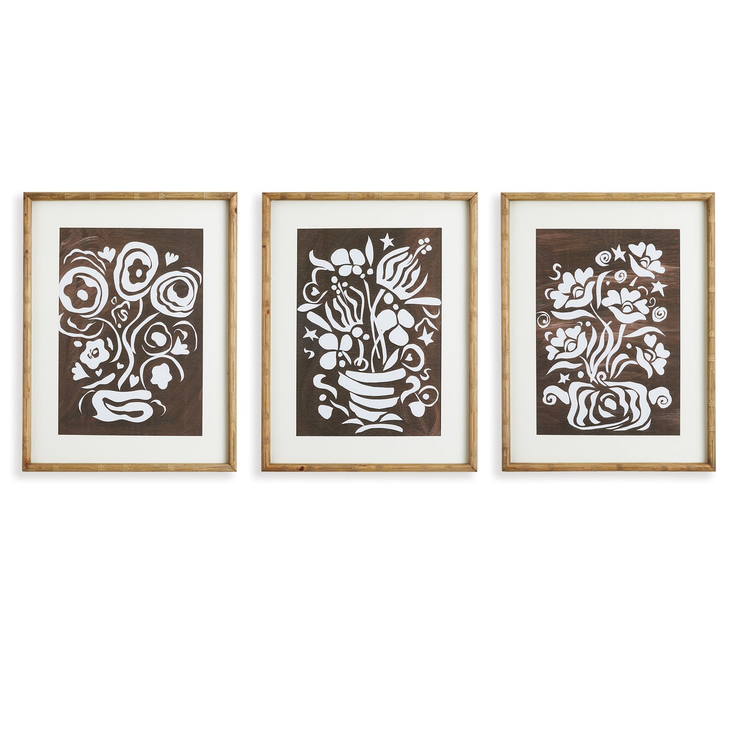 Made of whimsical cut out designs from the original artwork of Susan Nastasic, this playful set of three floral motifs are finished off with a printed mat and bamboo frames. In a warm neutral palette, a great set for den, family room or kitchen.