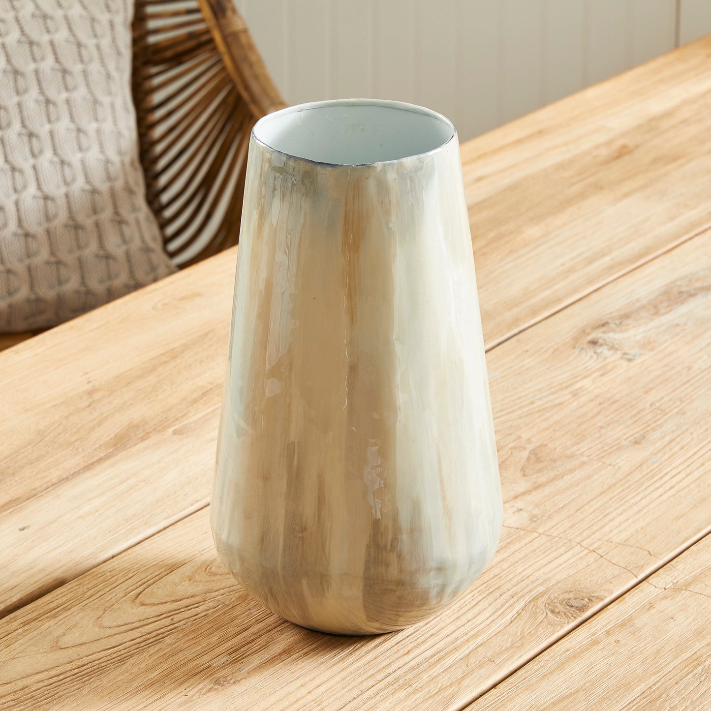 Using enameled iron in an innovative manner, these delicately crafted vases are hand-painted, each one featuring a charming tone-on-tone design. This technique produces a lovely light and creamy effect, making for a distinctive addition to any space. Crafted with expertise, Almeta White Pearl Vase Small stands out with its innovatively crafted enameled iron and charming tone-on-tone design. This unique technique produces an elegant, light and creamy effect that adds a distinctive touch to any room.