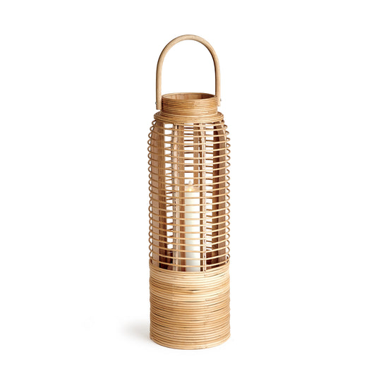 Crafted from sustainable bamboo, this tall and slim rattan lantern makes a statement while adding a touch of nature to any space. Its sleek design is perfect for coastal settings and beach houses, bringing the outdoors in with style and sustainability.