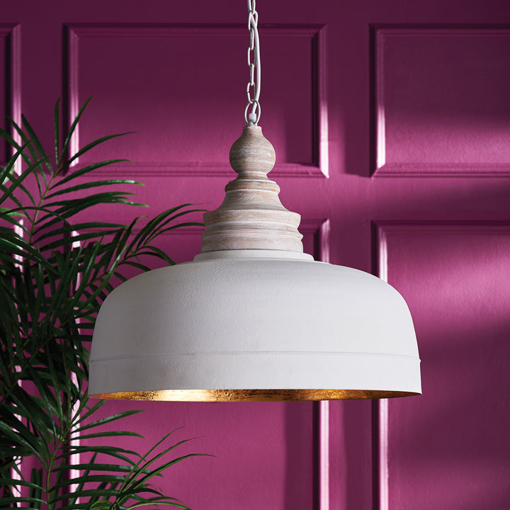 The Claudette Pendant Light expertly balances wood and metal to create a sophisticated and stylish lighting option. Illuminate your entryway, hallway, or kitchen table with elegance and grace using this well-crafted pendant light, featuring a stunning combination of materials.