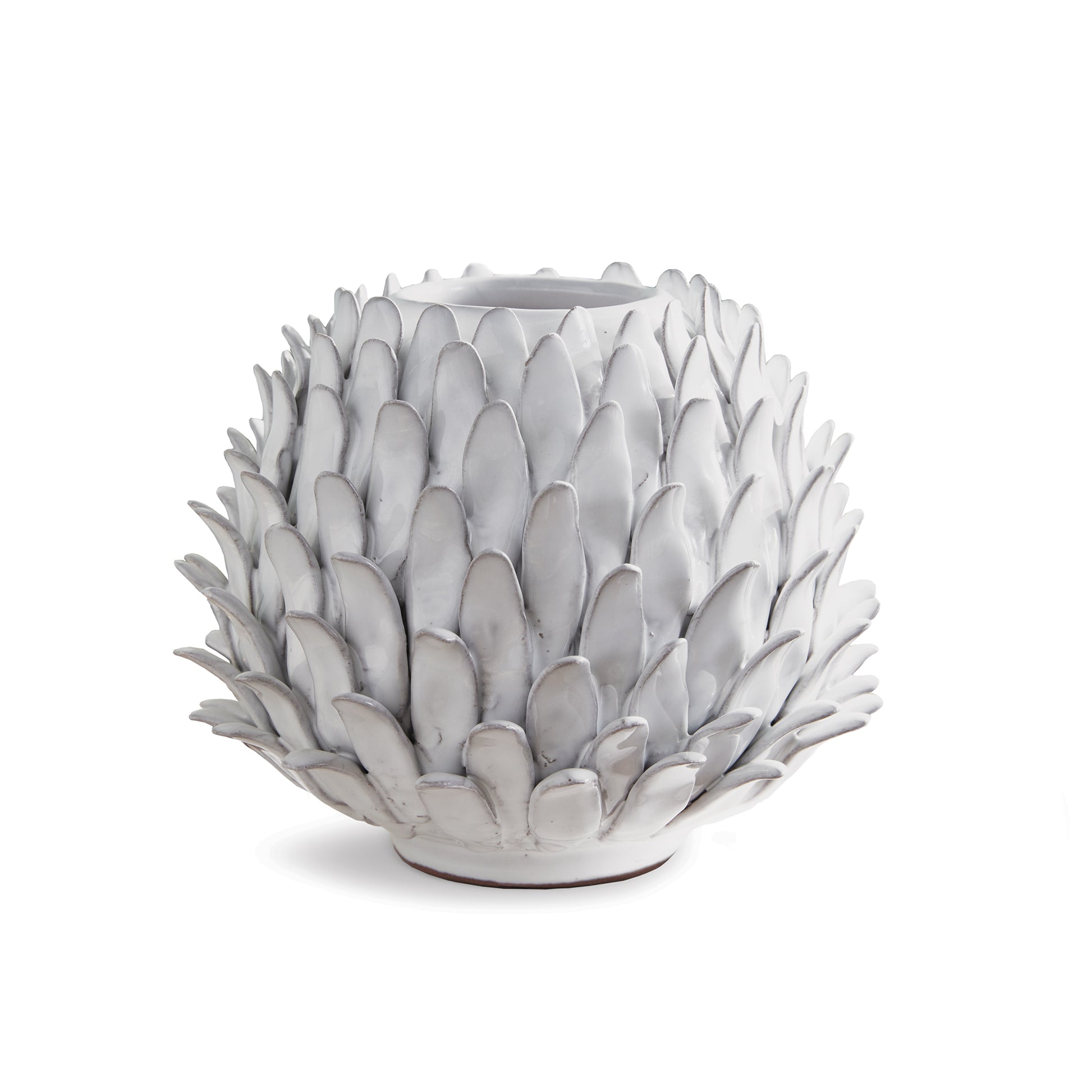 This Protea plant inspired vase is made by the hands of a skilled artisan. Each petal painstakingly applied, then glazed and fired. A true work of art for kitchen, living room or entryway.