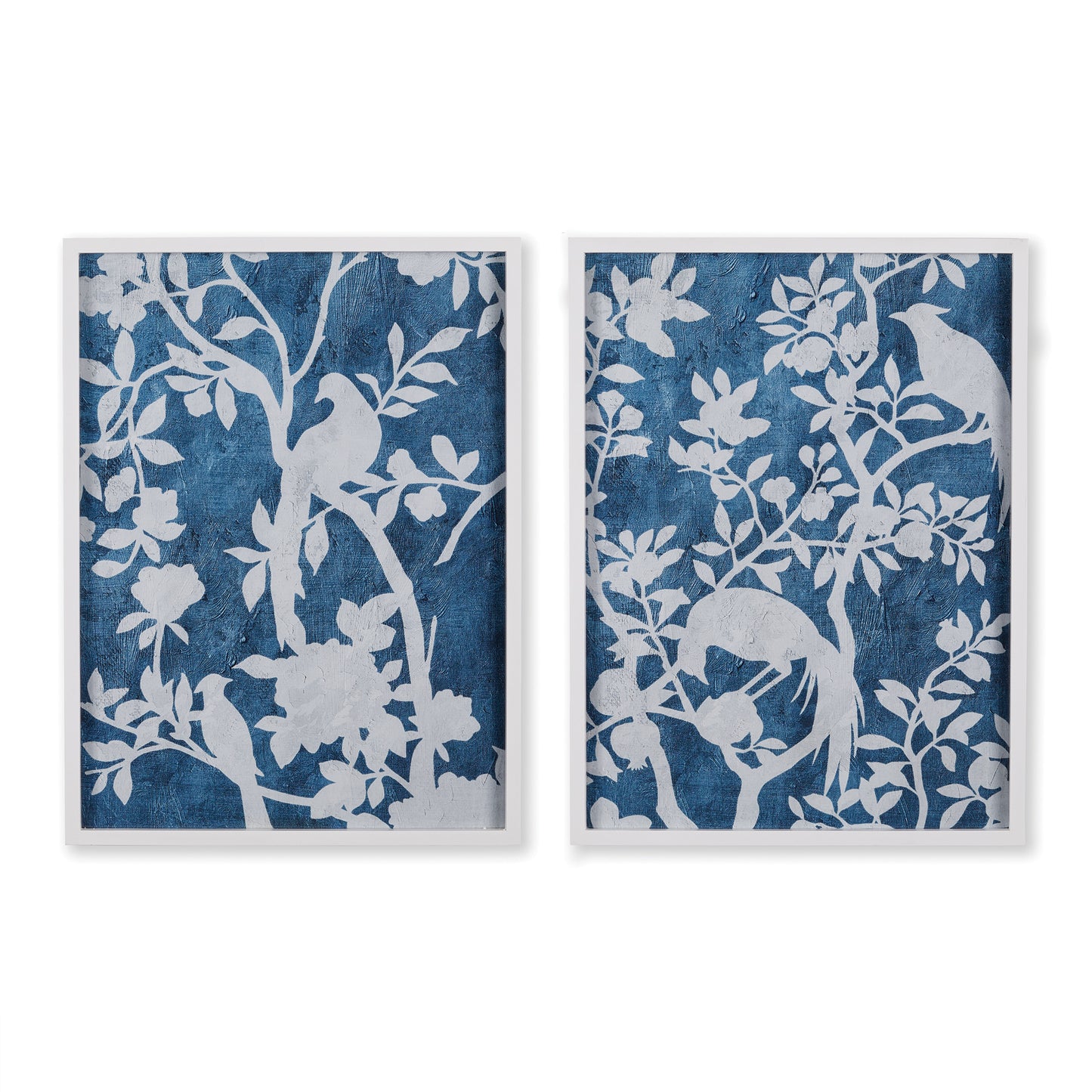 The floral-inspired prints in this set of two Floral Cyano Prints add a feminine touch to any room. With a bright white simple profile frame, the over scaled pair brings a light and airy feel to any space. Designed with a textile-inspired composition, these prints provide a beautiful and sophisticated touch.