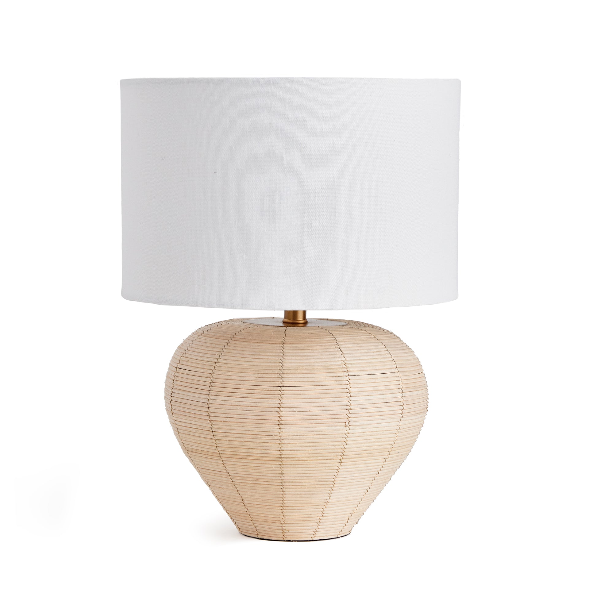 Woven in a natural cane rattan, with subtle variations in color making each one truly unique, this mini lamp is an instant classic. The petite shape and tailored shade make it the ideal lamp for kitchen counter or small workspace.