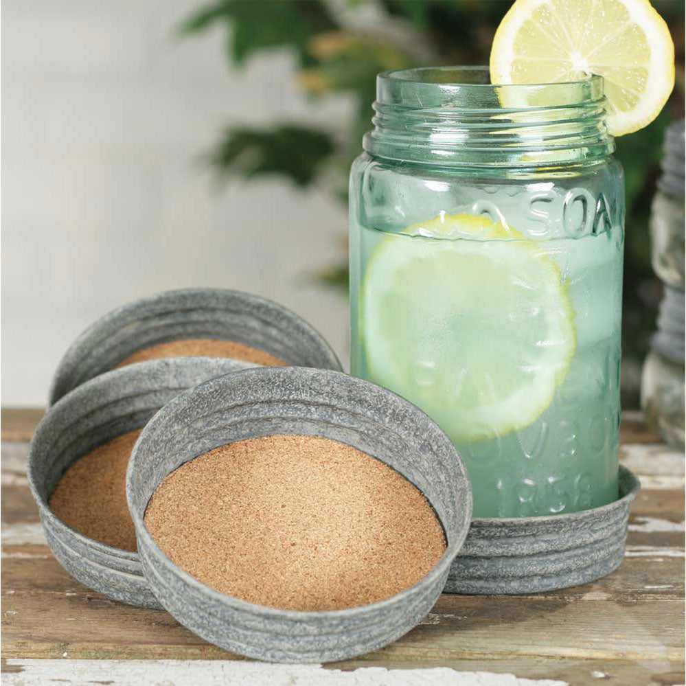 These rustic barn style cork coasters are designed with a charming mason jar motif, perfect for adding a country touch to your decor. The cork material not only absorbs moisture but also provides a sturdy surface for your drink. Use the included jute tie to easily fit them onto a mason jar for a unique and functional decoration.
