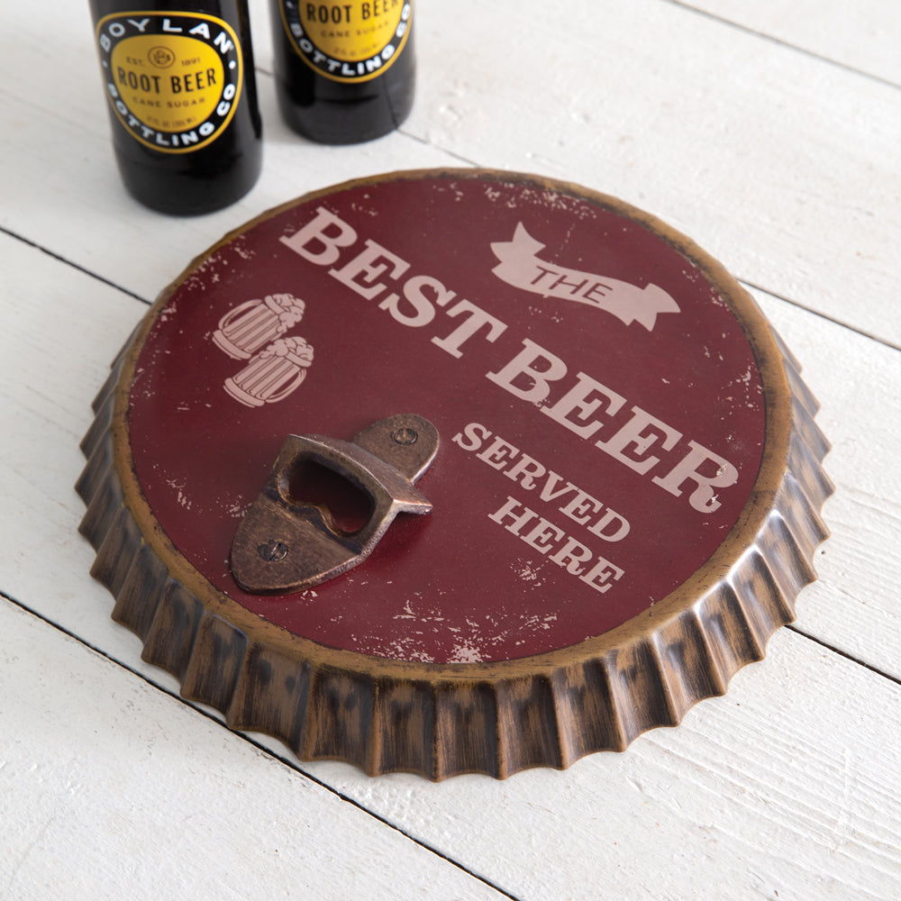 Effortlessly open beer bottles with this unique wall art piece. Featuring a bottle opener and bottle cap design, this beer sign is the perfect addition to any kitchen, man cave, or rustic themed space. Say goodbye to fumbling for a bottle opener and hello to functional and stylish wall decor.