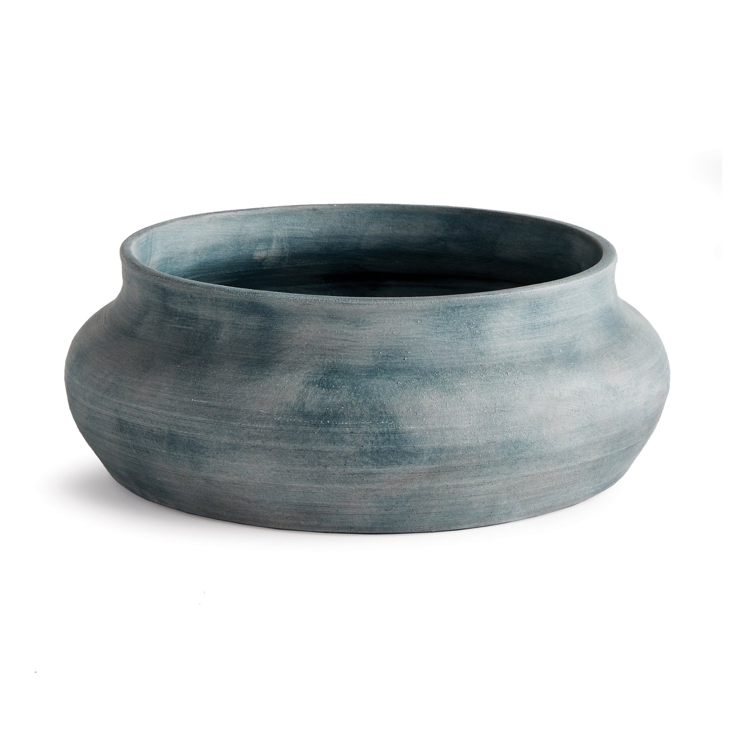 Hand thrown and perfectly imperfect, this terracotta bowl brings the character. With subtle horizontal ribbing that shows through the white uneven gray-blue glaze, It makes a lovely accent tucked in a bookshelf, or featured on a mantle or console.